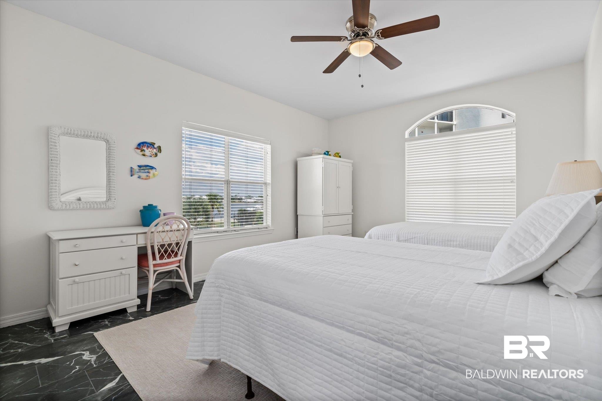 3575 Bayou Road, Unit A 10 Orange Beach, AL 36561 - Photo 16 of 31 Bedroom with decorative rug over polished porcelain tile.