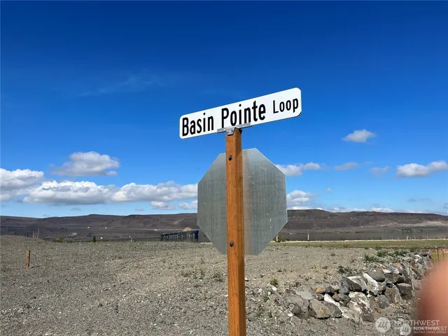 a view of a road with an ocean view