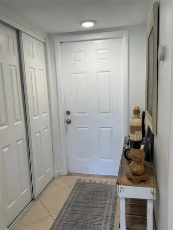 a view of a trees in a yard with large trees