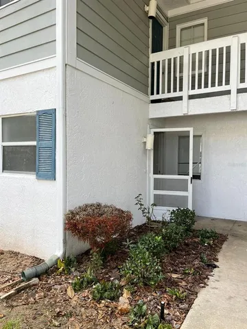 a house view with a outdoor space
