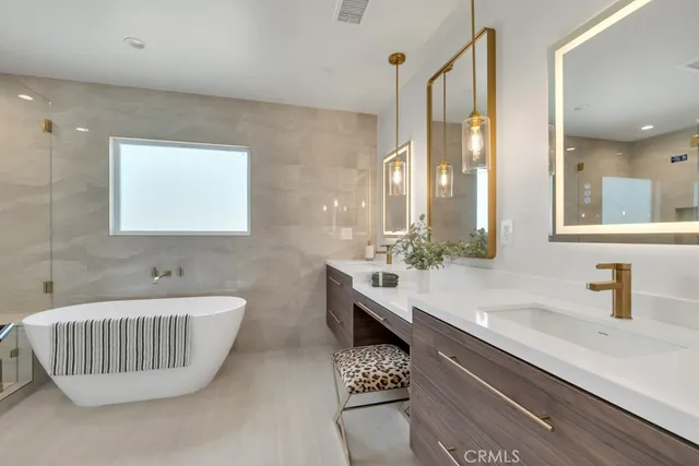 a bathroom with a toilet and a sink