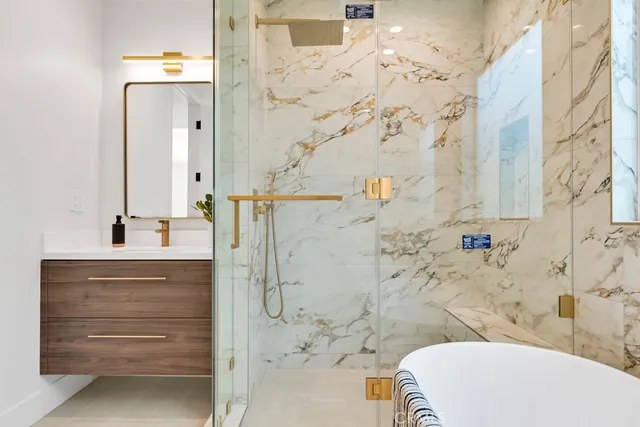 a bathroom with a bathtub and a sink