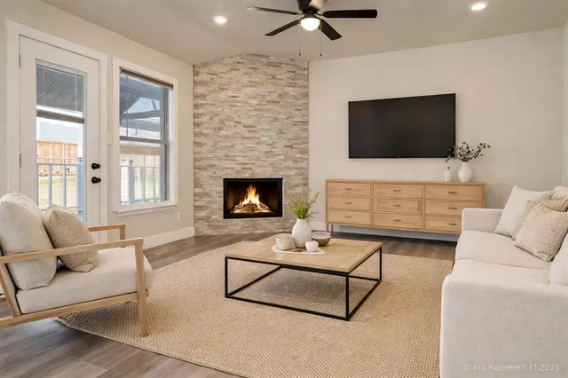 a living room with furniture or fireplace and a flat screen tv