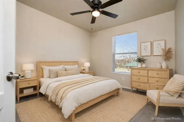 a bedroom with a bed and furniture