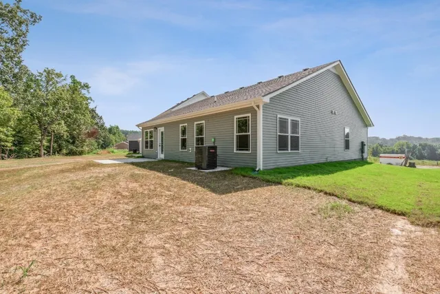 a house with yard in front of it