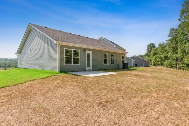 a front view of house with yard