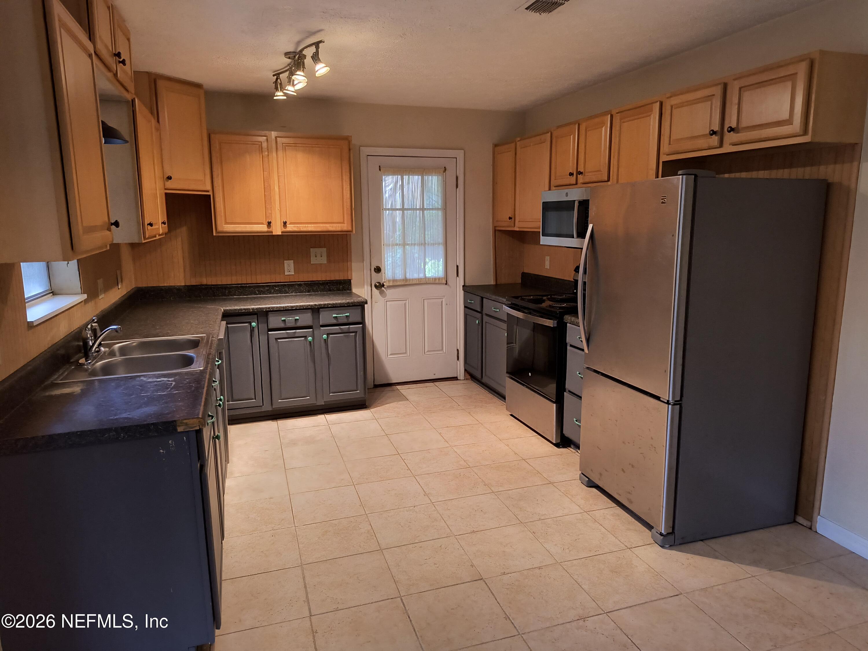 1183 Violet Street Atlantic Beach, FL 32233 - Photo 5 of 16 IMG_20260619_161114499_HDR