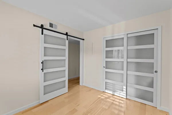 a view of an empty room with empty racks