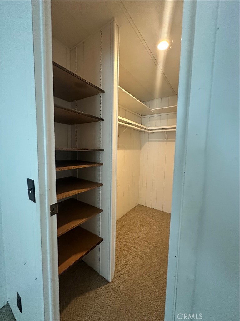 881 North Lake Street, Unit 301 Hemet, CA 92544 - Photo 14 of 21 a view of an empty walk in closet