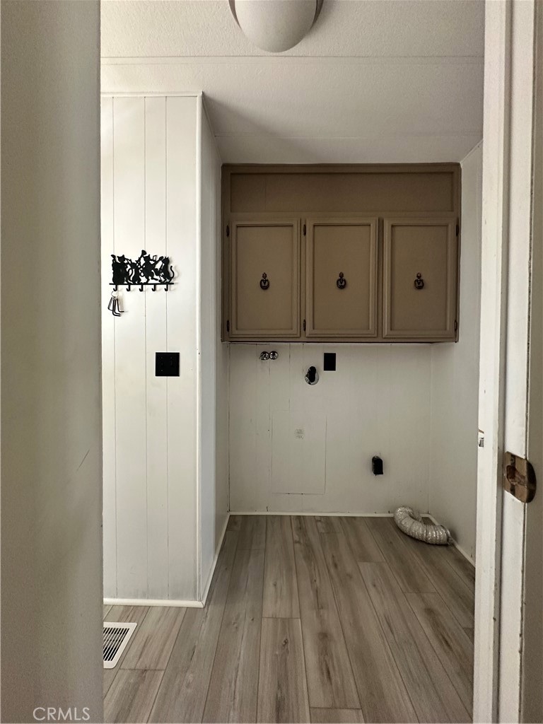 881 North Lake Street, Unit 301 Hemet, CA 92544 - Photo 17 of 21 a view of a room with wooden floor