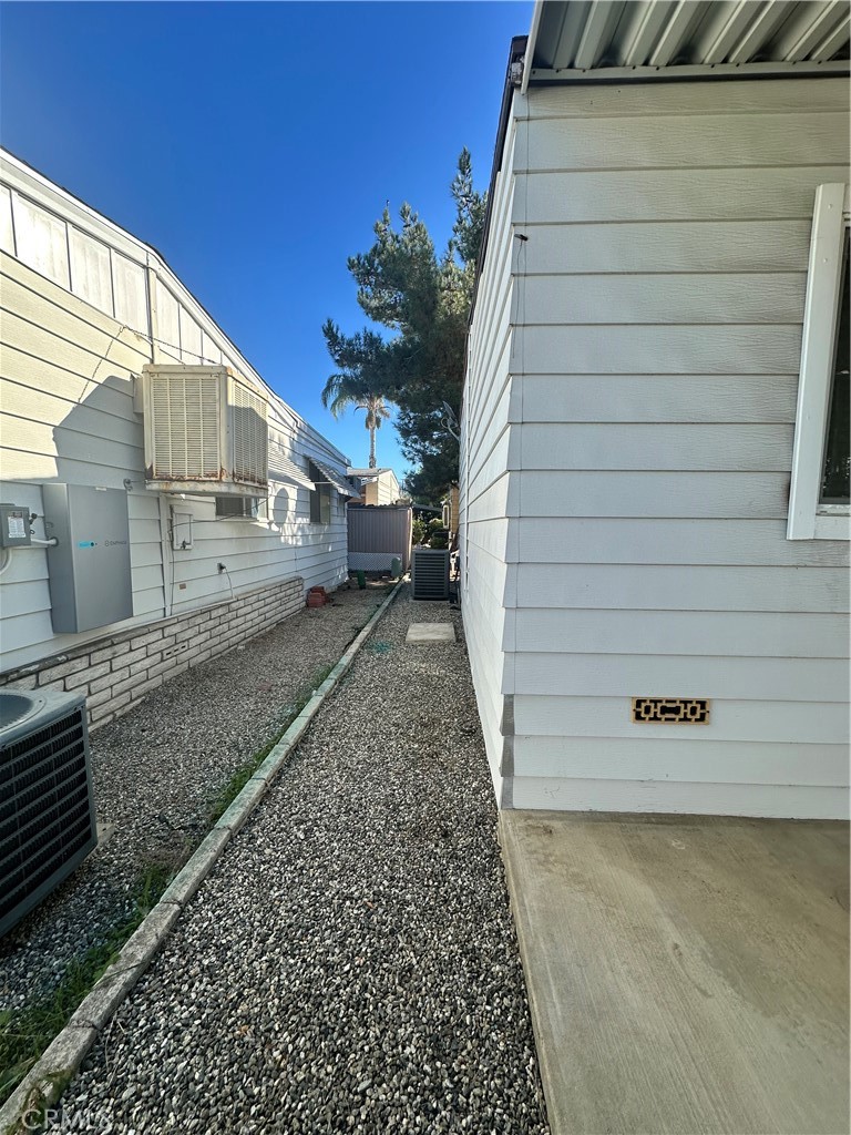881 North Lake Street, Unit 301 Hemet, CA 92544 - Photo 20 of 21 a view of a house with a yard