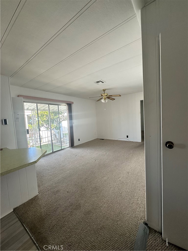 881 North Lake Street, Unit 301 Hemet, CA 92544 - Photo 5 of 21 a view of an empty room with a window