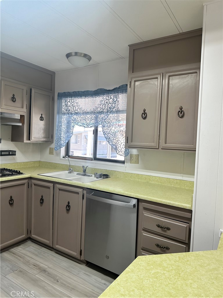 881 North Lake Street, Unit 301 Hemet, CA 92544 - Photo 8 of 21 a bathroom with a sink a vanity and mirror