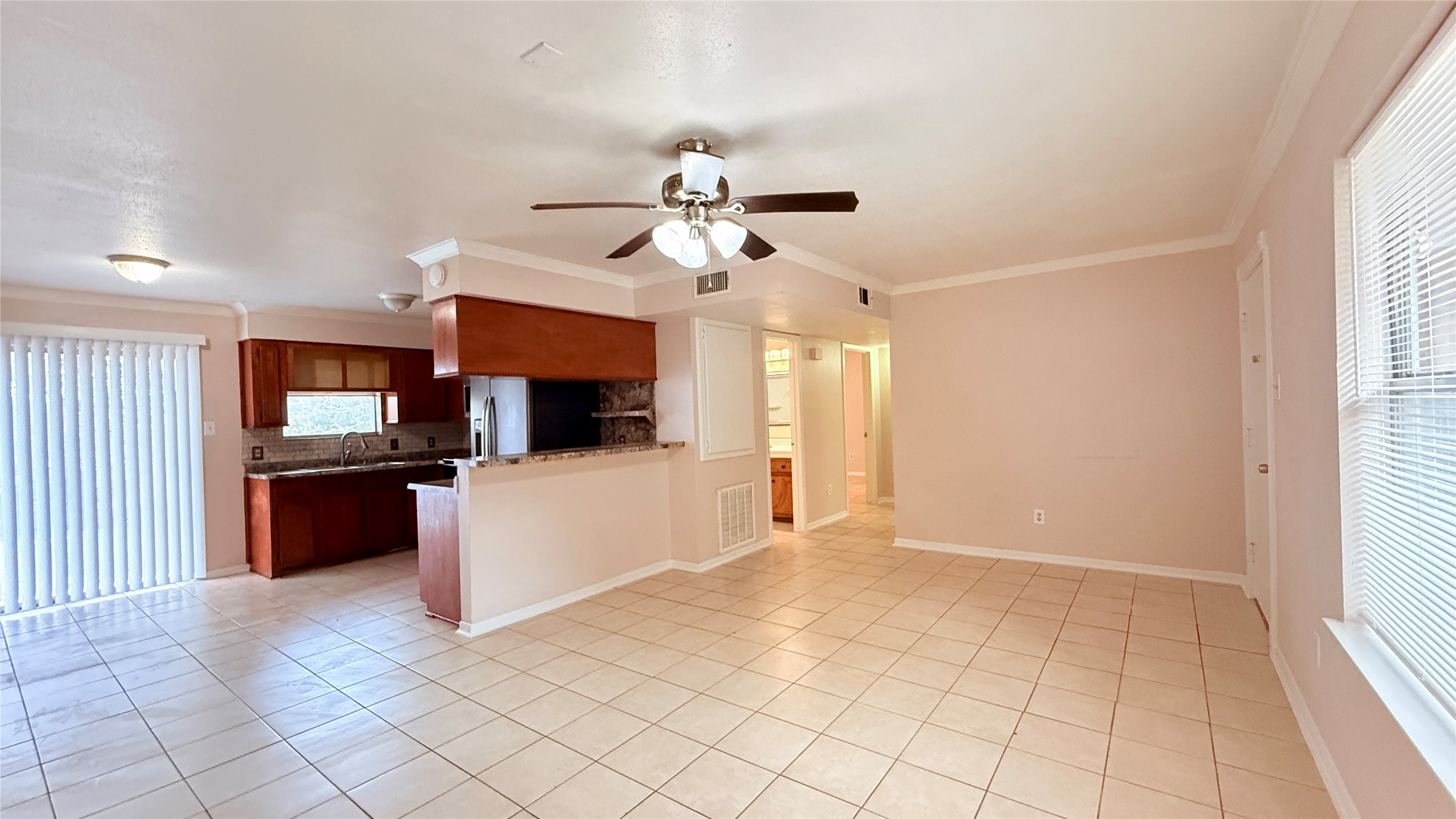 208 Laurie Lane Willis, TX 77378 - Photo 11 of 35 a living room with furniture and a flat screen tv