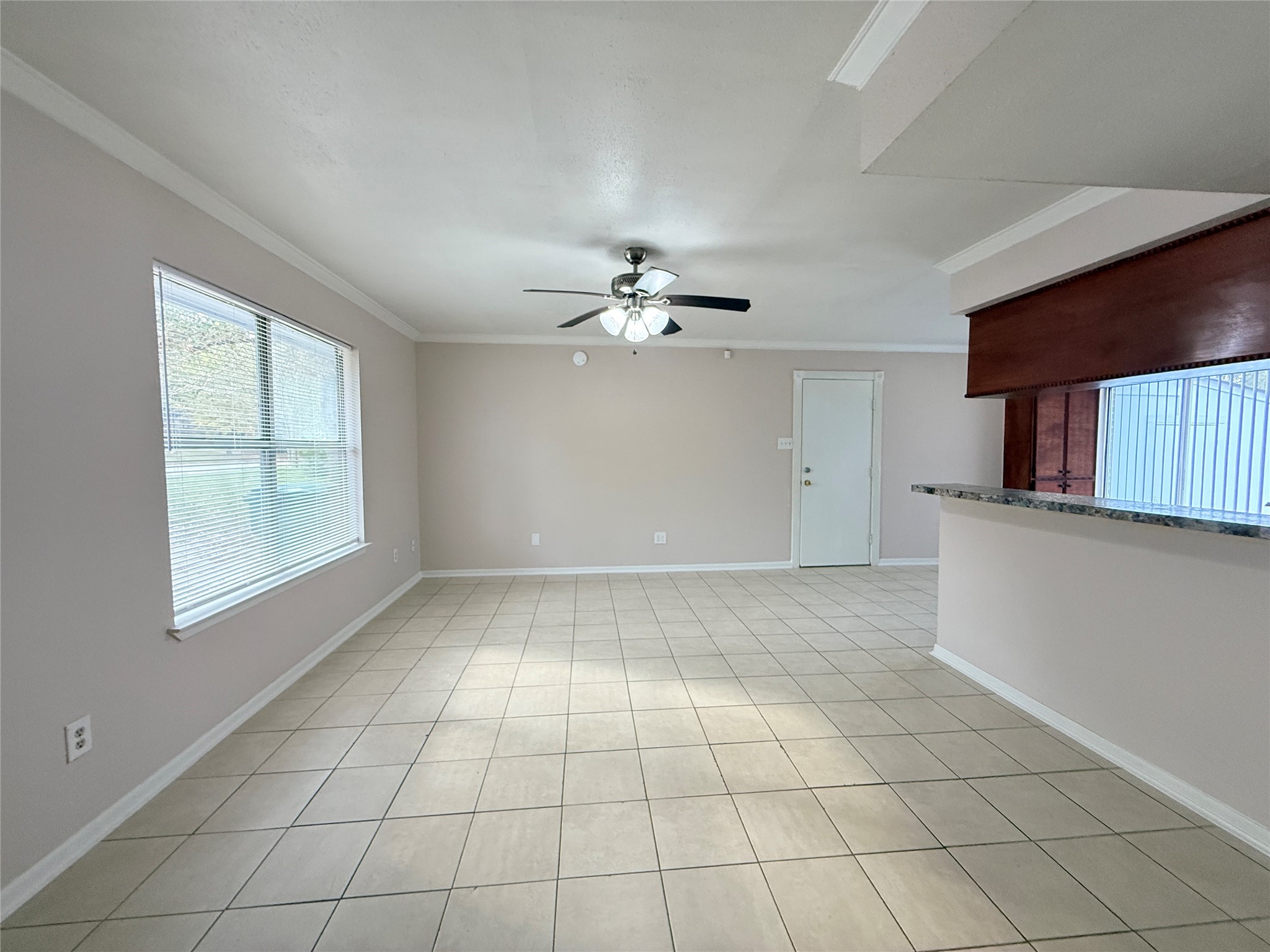 208 Laurie Lane Willis, TX 77378 - Photo 13 of 35 a view of an empty room with a window