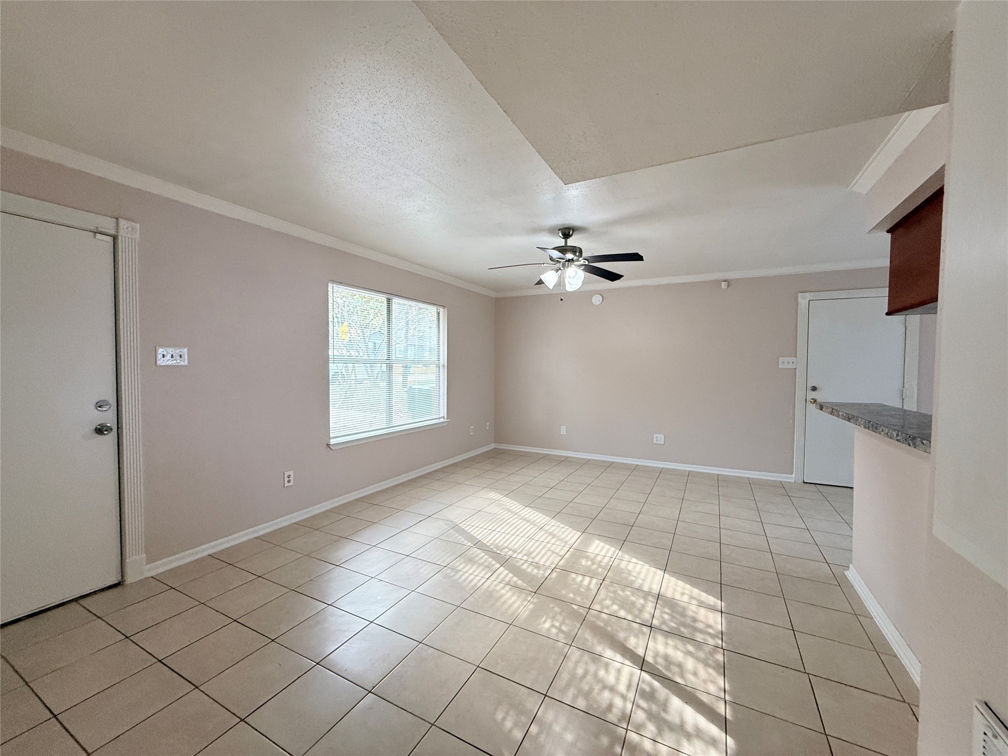 208 Laurie Lane Willis, TX 77378 - Photo 14 of 35 a view of an empty room with a window