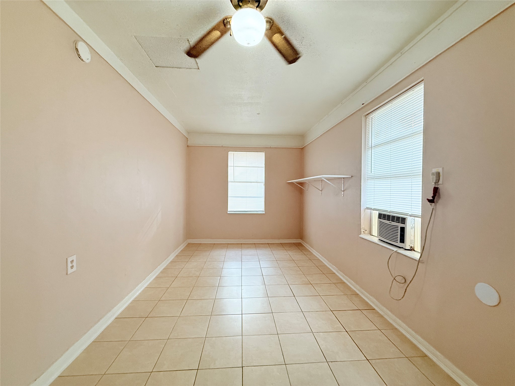 208 Laurie Lane Willis, TX 77378 - Photo 28 of 35 a view of an empty room with a window