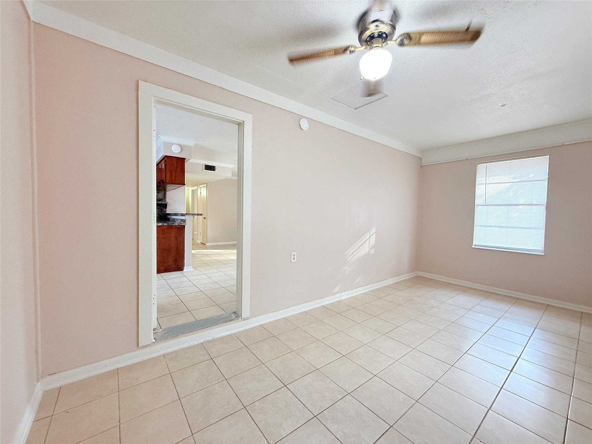 208 Laurie Lane Willis, TX 77378 - Photo 29 of 35 a view of an empty room and window