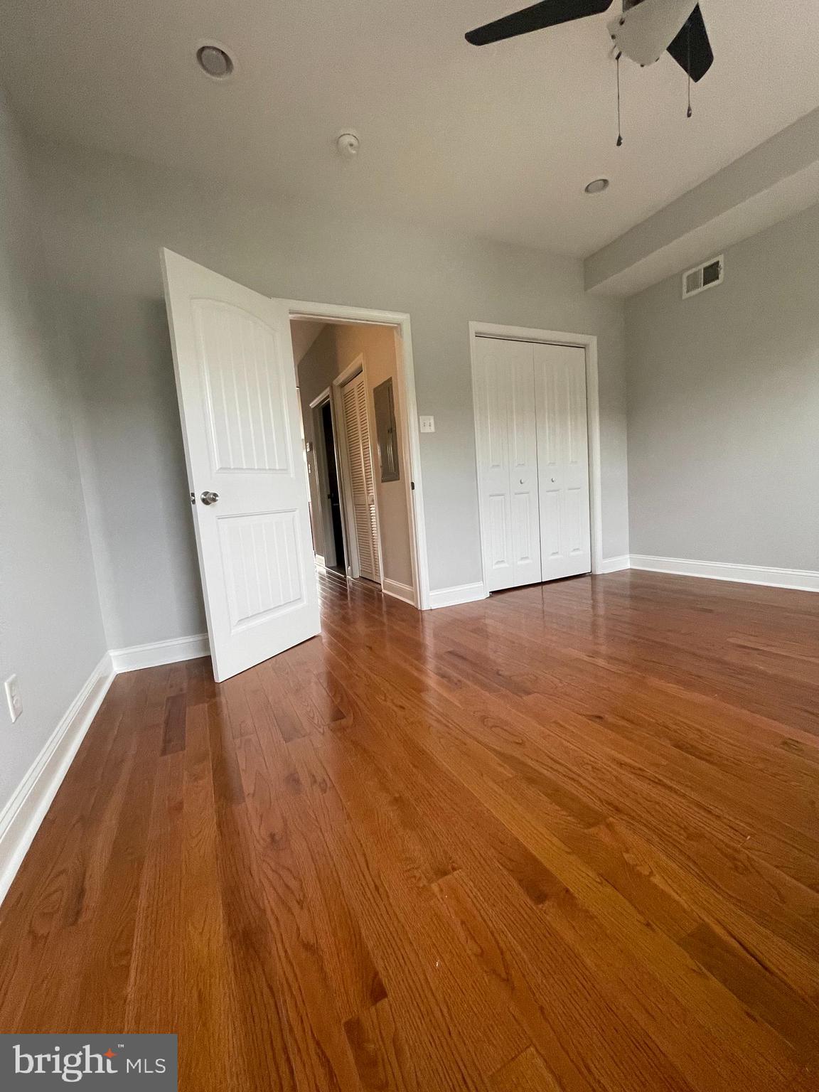 2510 Federal Street, Unit 2 Philadelphia, PA 19146 - Photo 8 of 22 a view of an empty room with wooden floor