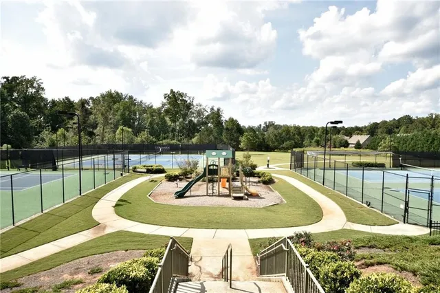 a view of a garden with houses