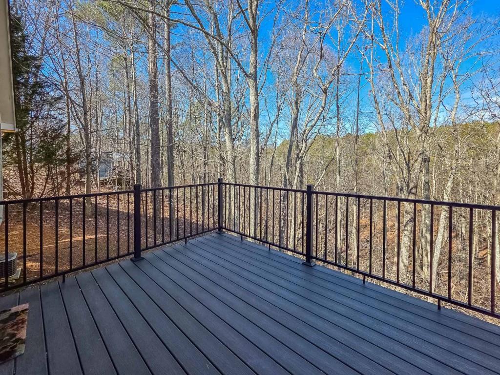 165 Horseshoe Bend Jasper, GA 30143 - Photo 34 of 44 a view of a wooden roof with wooden floor