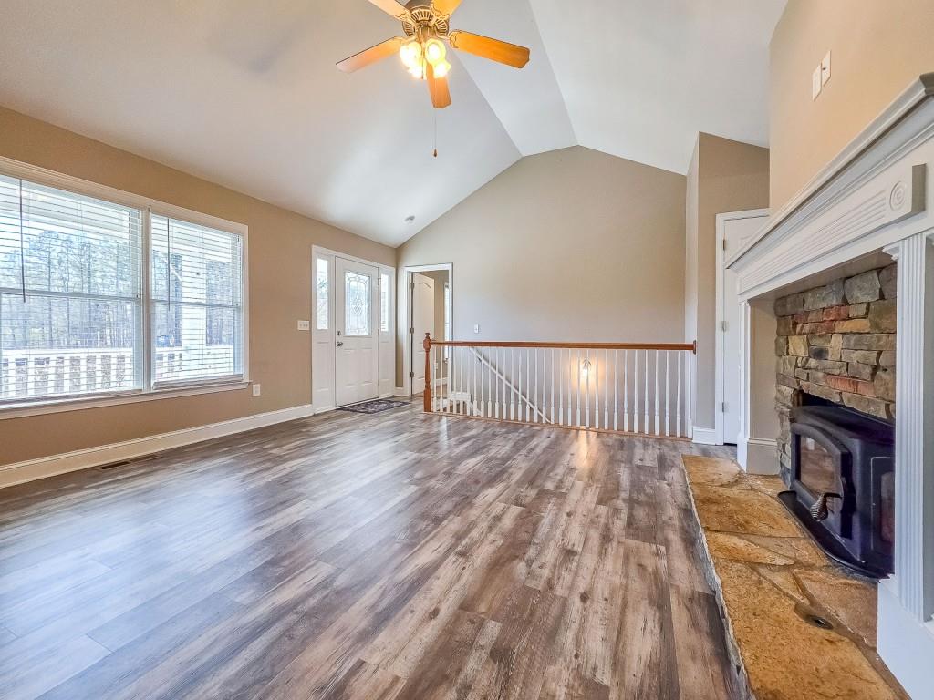 165 Horseshoe Bend Jasper, GA 30143 - Photo 10 of 44 a view of empty room with wooden floor and fan