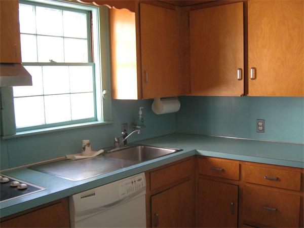 52 Pilgrim Road Needham, MA 02492 - Photo 7 of 10 a kitchen with a sink and a window