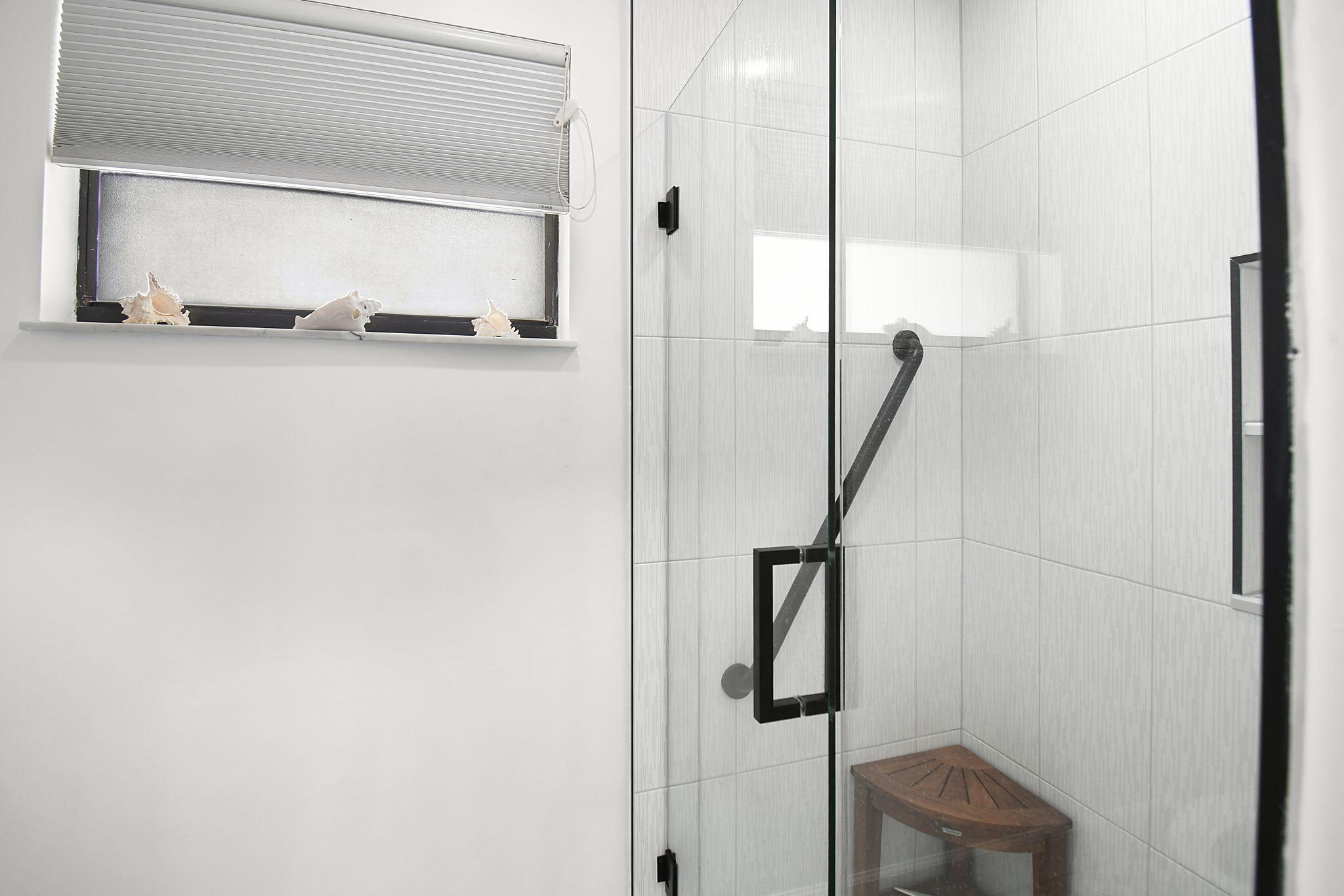 5251 Southeast Sea Island Way Stuart, FL 34997 - Photo 23 of 68 a bathroom with a shower and a sink