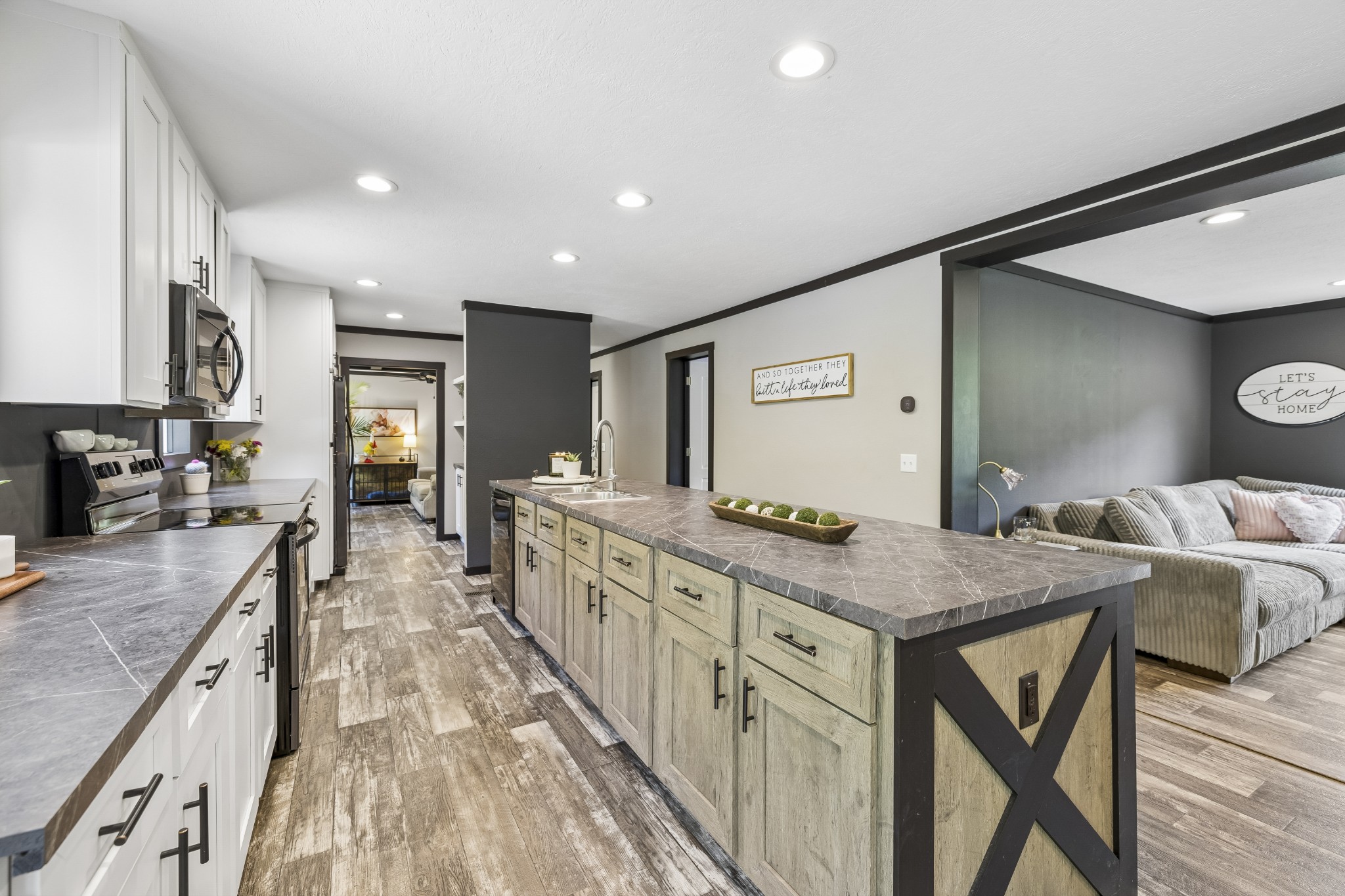 8079 Golf Club Road Mount Pleasant, TN 38474 - Photo 17 of 74 a kitchen with stainless steel appliances granite countertop lots of counter top space and wooden floor