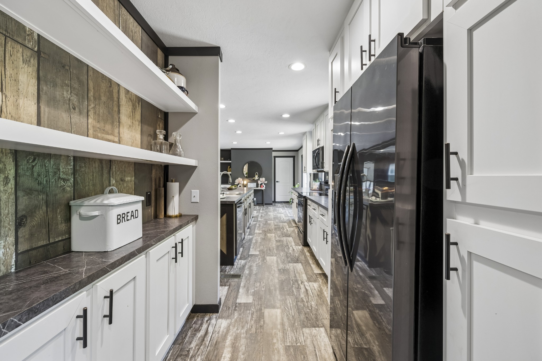 8079 Golf Club Road Mount Pleasant, TN 38474 - Photo 28 of 74 a open kitchen with stainless steel appliances granite countertop a refrigerator and a sink