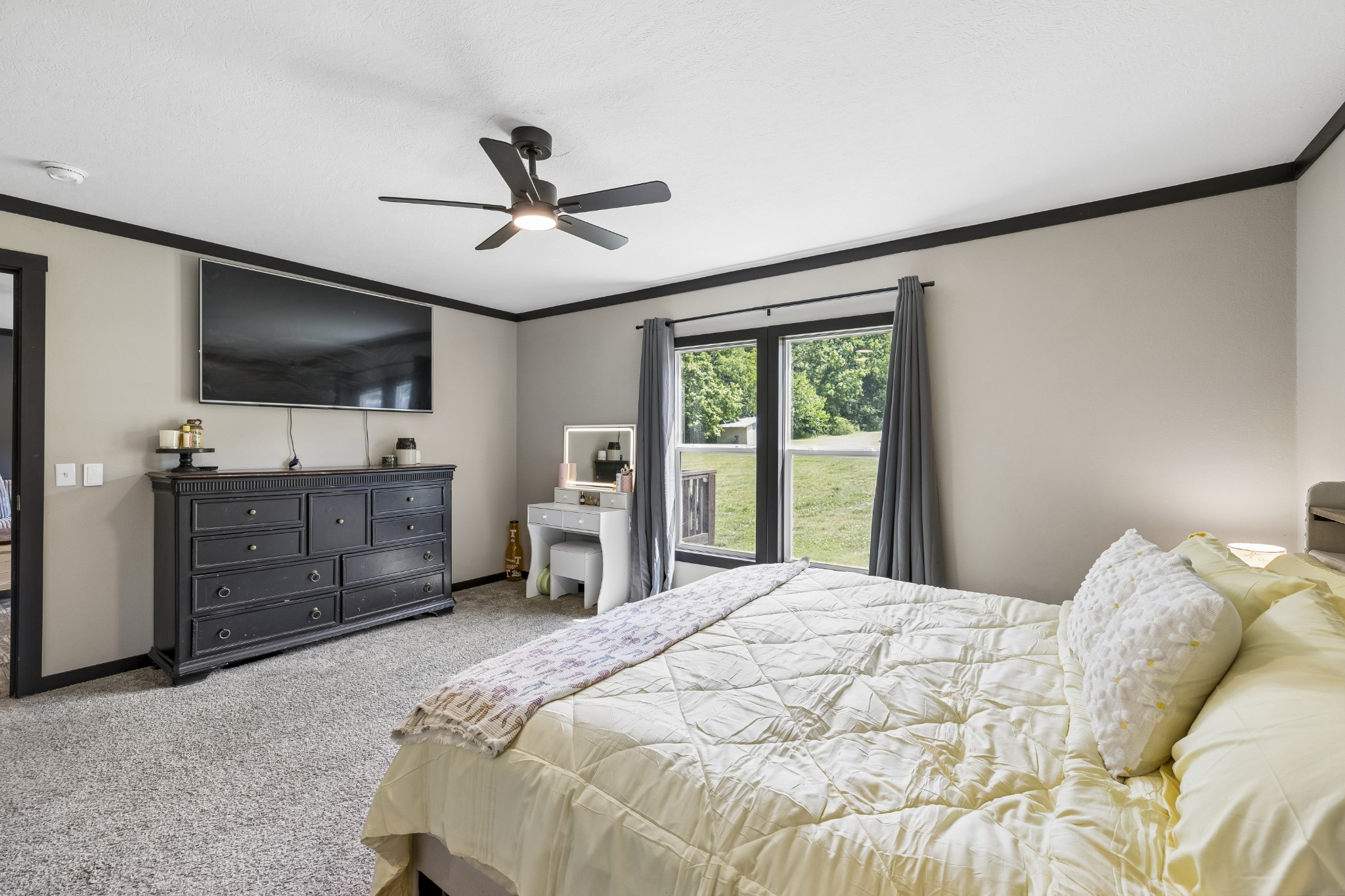 8079 Golf Club Road Mount Pleasant, TN 38474 - Photo 36 of 74 a bedroom with a large bed and a tv