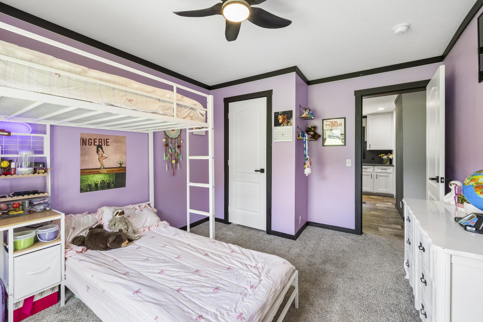 8079 Golf Club Road Mount Pleasant, TN 38474 - Photo 54 of 74 a bedroom with a bed dresser and a flat tv screen