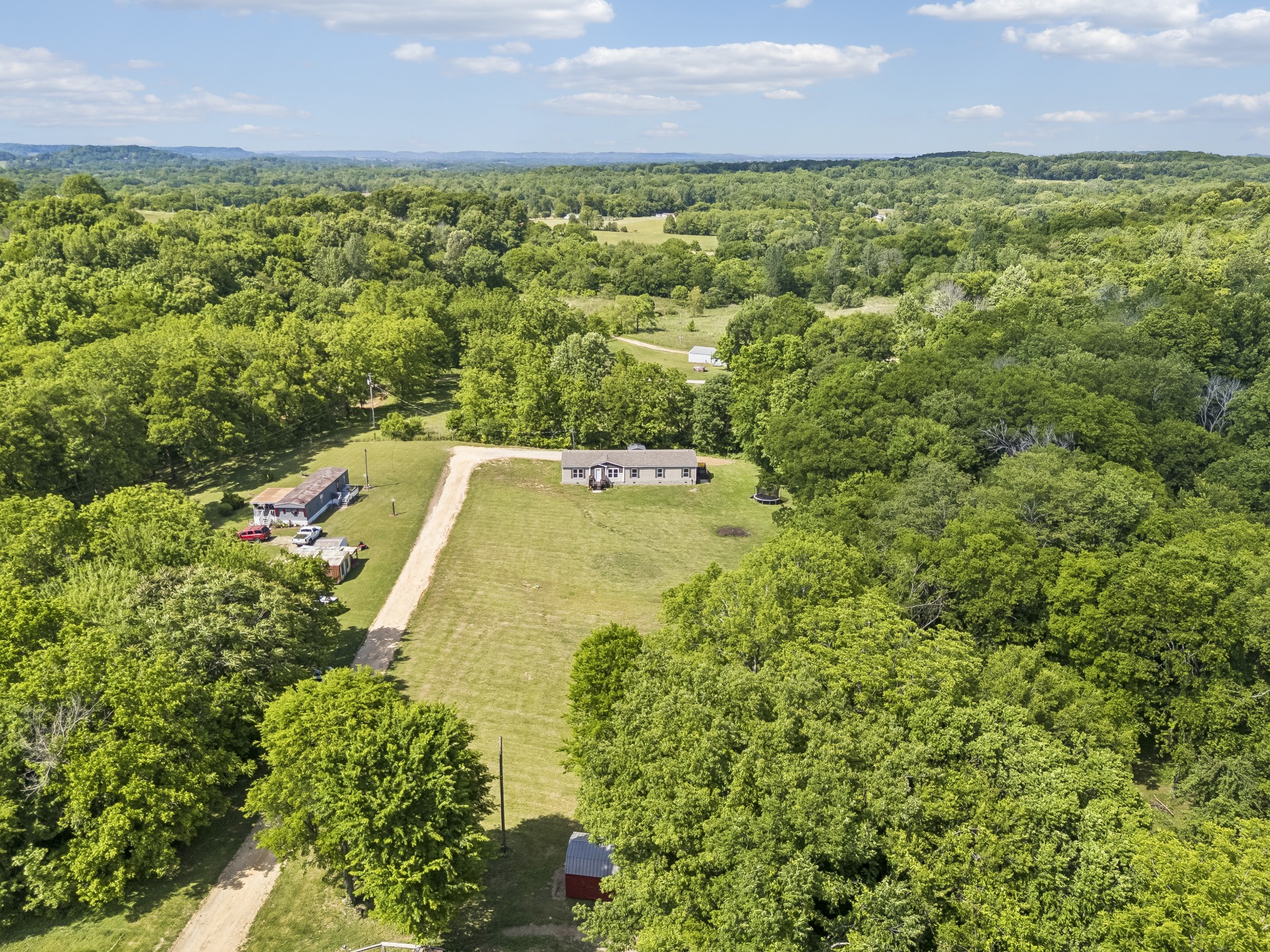 8079 Golf Club Road Mount Pleasant, TN 38474 - Photo 68 of 74 a view of a yard with an outdoor space