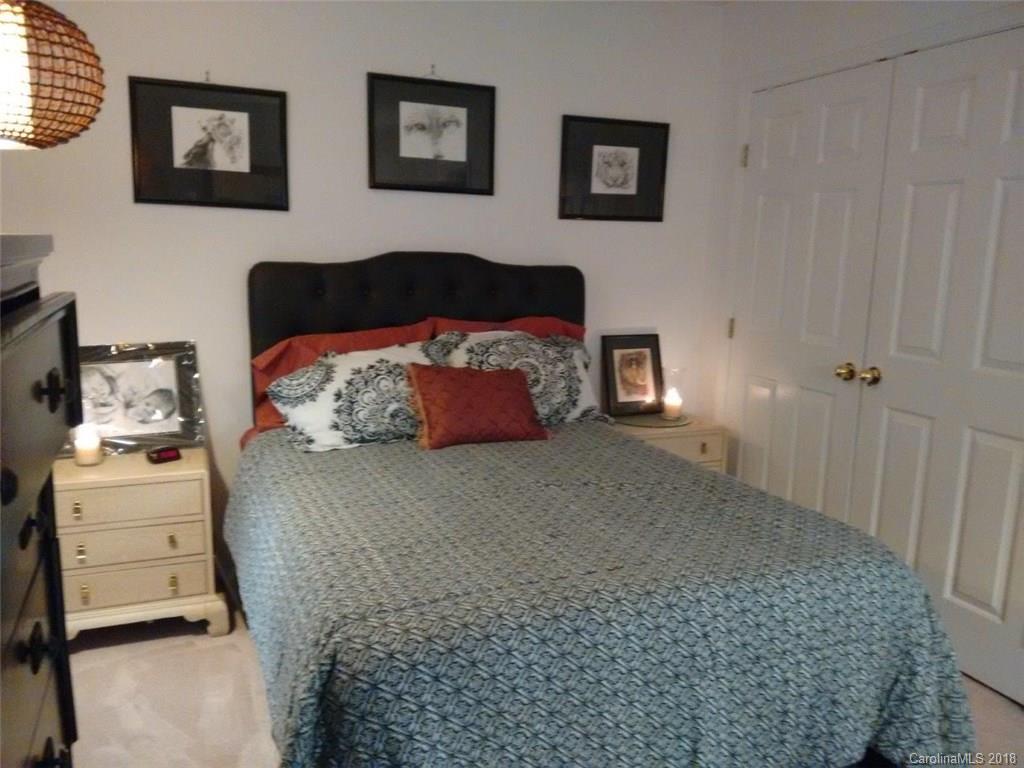 7017 Meyer Road Fort Mill, SC 29715 - Photo 17 of 26 a bedroom with a bed and a couch