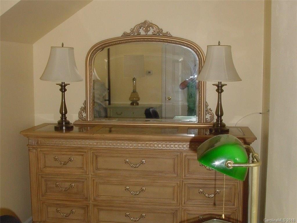 7017 Meyer Road Fort Mill, SC 29715 - Photo 22 of 26 a bathroom with a sink and mirror