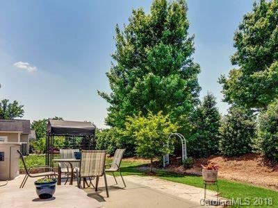 7017 Meyer Road Fort Mill, SC 29715 - Photo 24 of 26 a view of a chairs and table in the patio