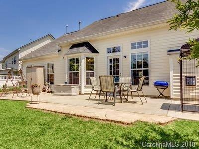 7017 Meyer Road Fort Mill, SC 29715 - Photo 25 of 26 a building outdoor space with patio furniture and garden