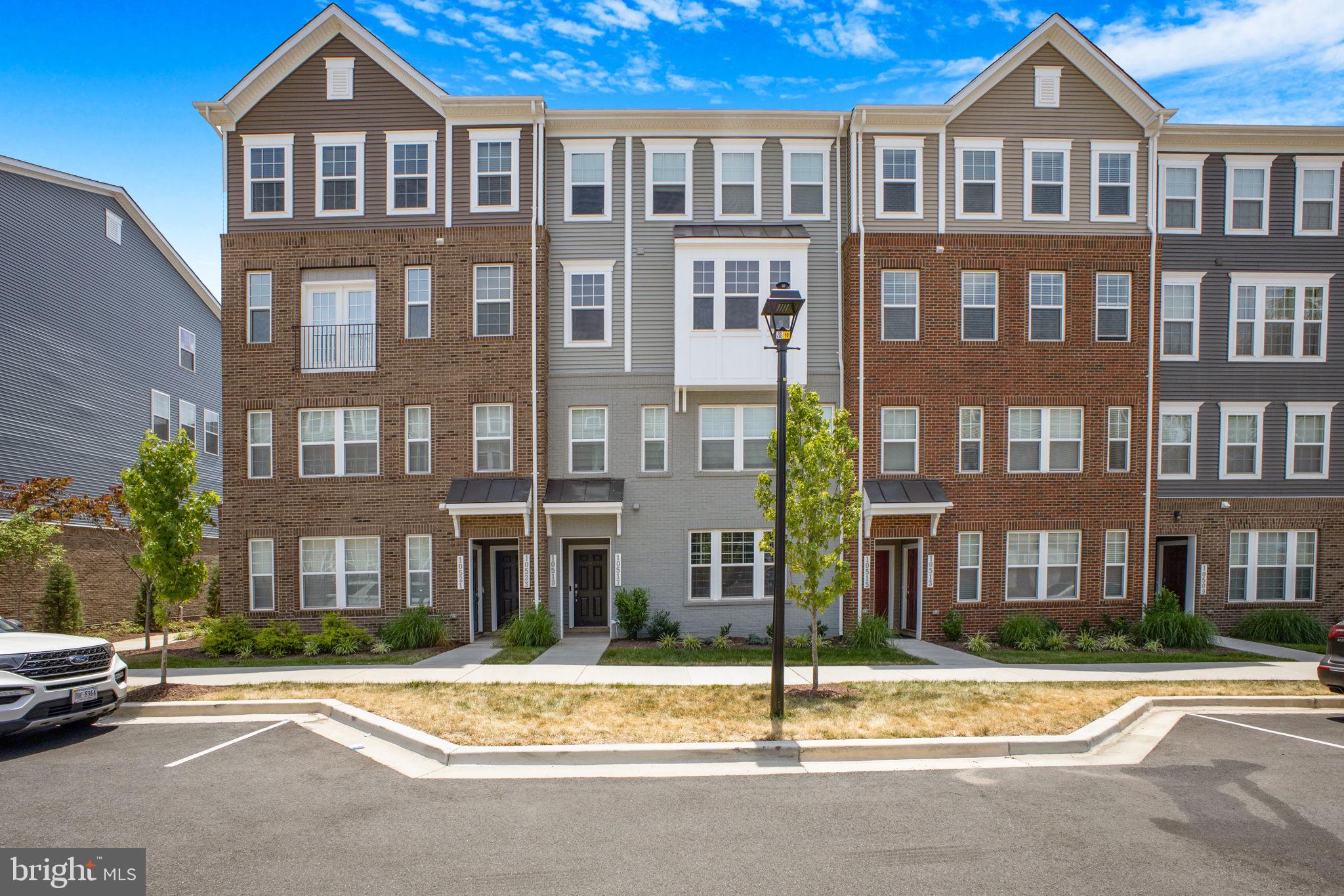 Modern townhomes in a vibrant setting.