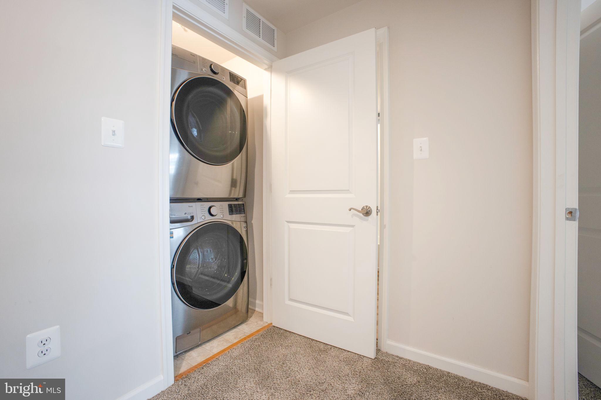 10517 Sally Ride Lane Lanham, MD 20706 - Photo 37 of 37 a utility room with dryer and washer