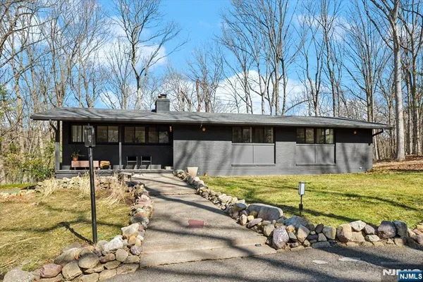 a view of a house with swimming pool