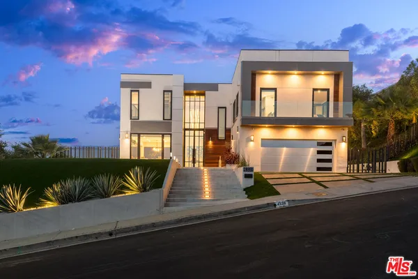 a view of a house with a patio