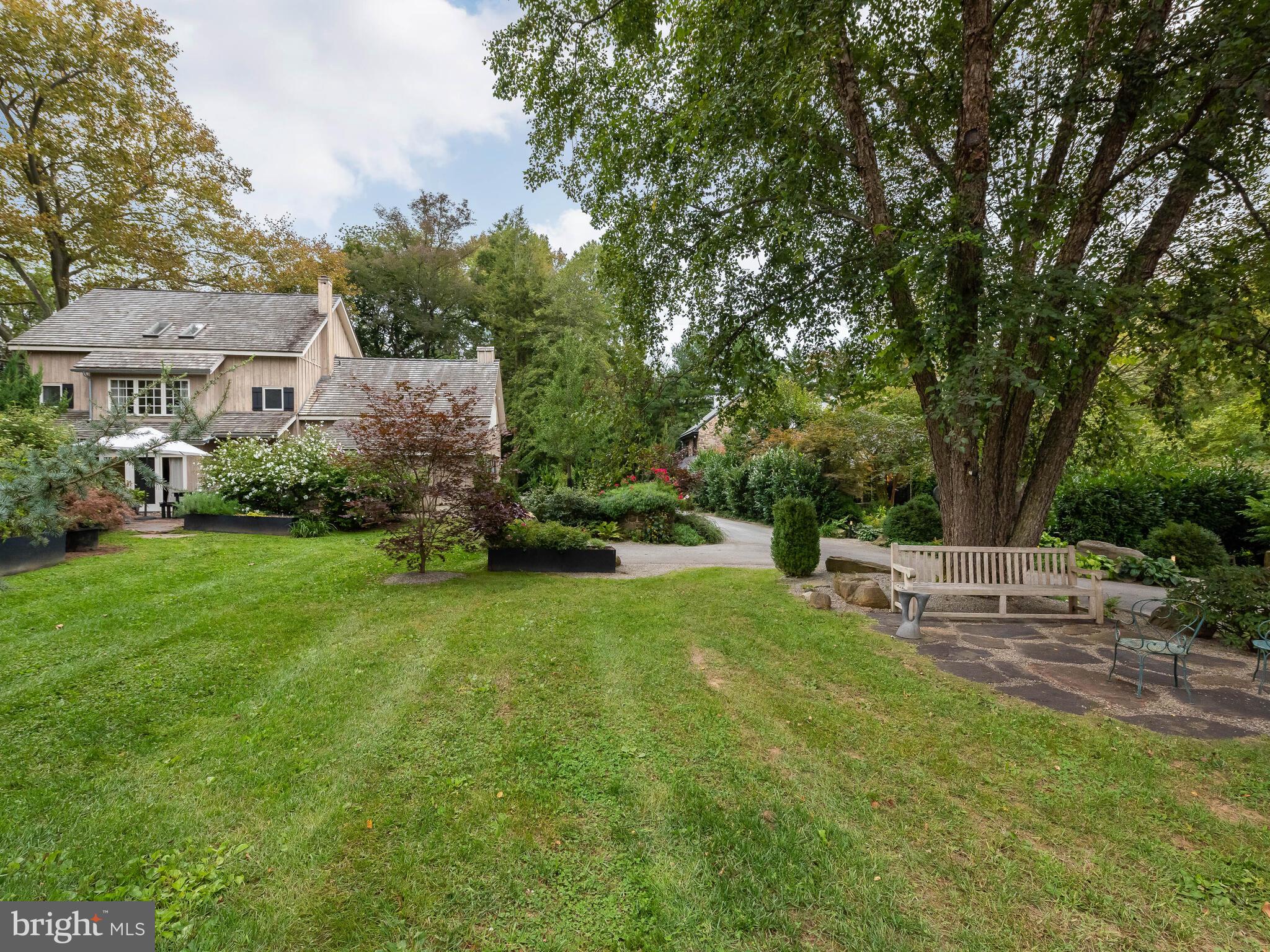 2211 Grubbs Mill Road Berwyn, PA 19312 - Photo 5 of 57 Sweeping lawn with view of cottage/coach house