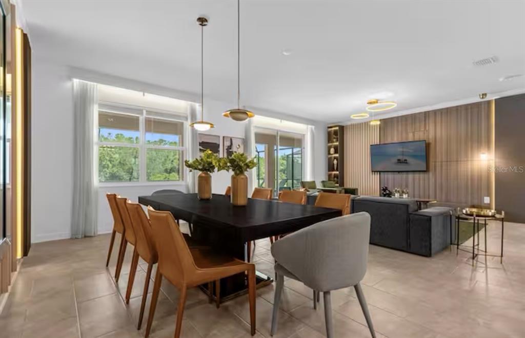 2992 Penelope Loop Kissimmee, FL 34746 - Photo 18 of 83 a view of a dining room with furniture window and outside view