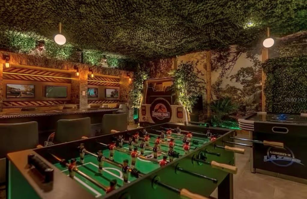 2992 Penelope Loop Kissimmee, FL 34746 - Photo 26 of 83 a view of a chairs and table in a backyard