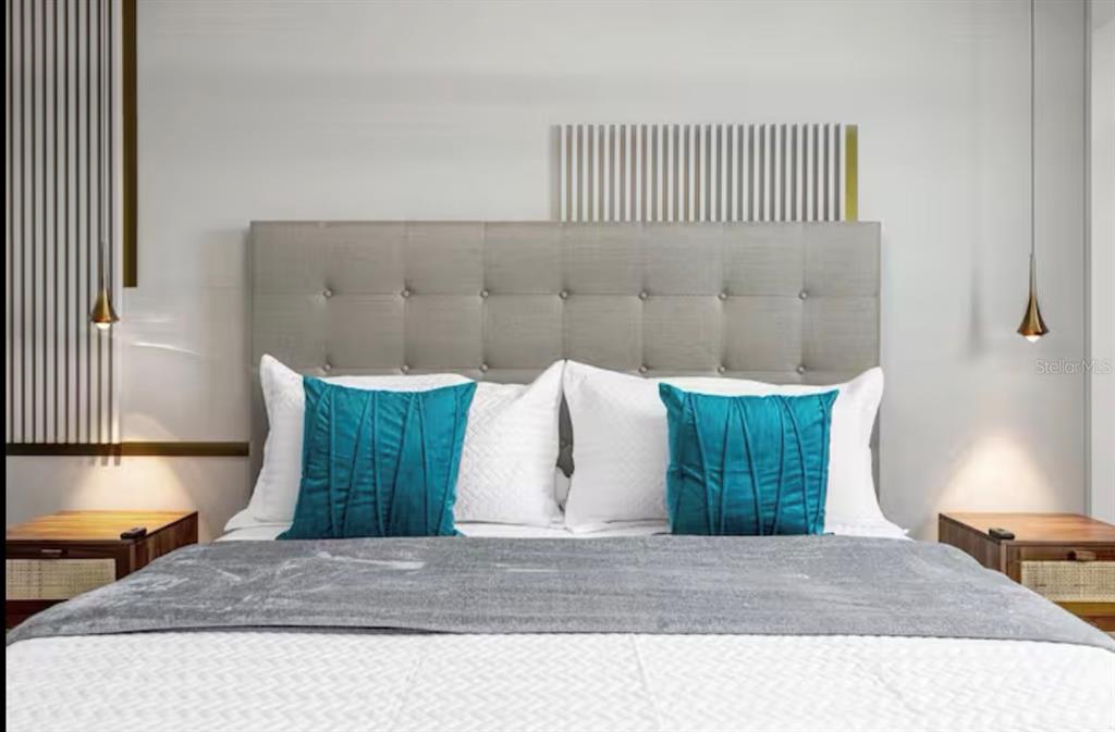 2992 Penelope Loop Kissimmee, FL 34746 - Photo 51 of 83 a living room with a bed