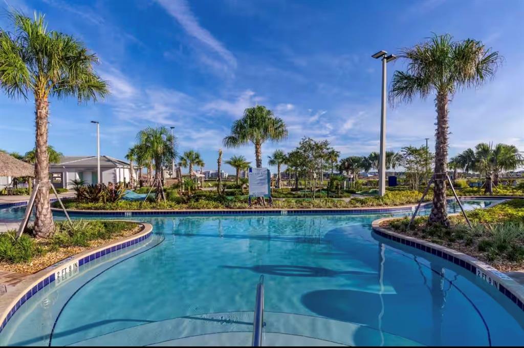 2992 Penelope Loop Kissimmee, FL 34746 - Photo 68 of 83 a view of swimming pool from a patio