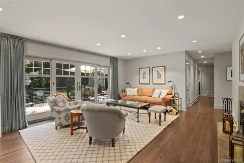 a bed room with a bed and glass window