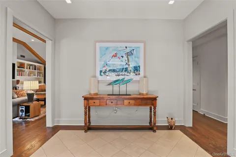 a view of room with furniture and wooden floor