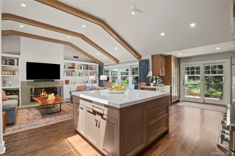 a view of kitchen with stainless steel appliances granite countertop a lot of counter top space