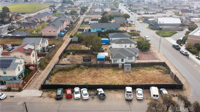 an aerial view of a house with swimming pool